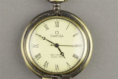 omega swiss made pocket watch with dual time|omega headquarters switzerland.